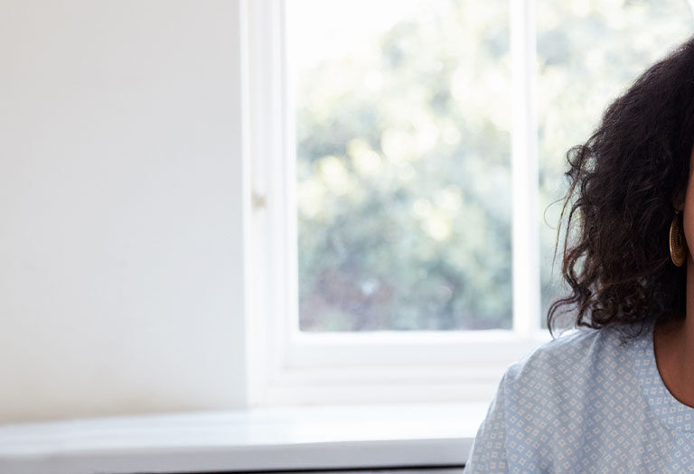 happy woman laughing at the camera